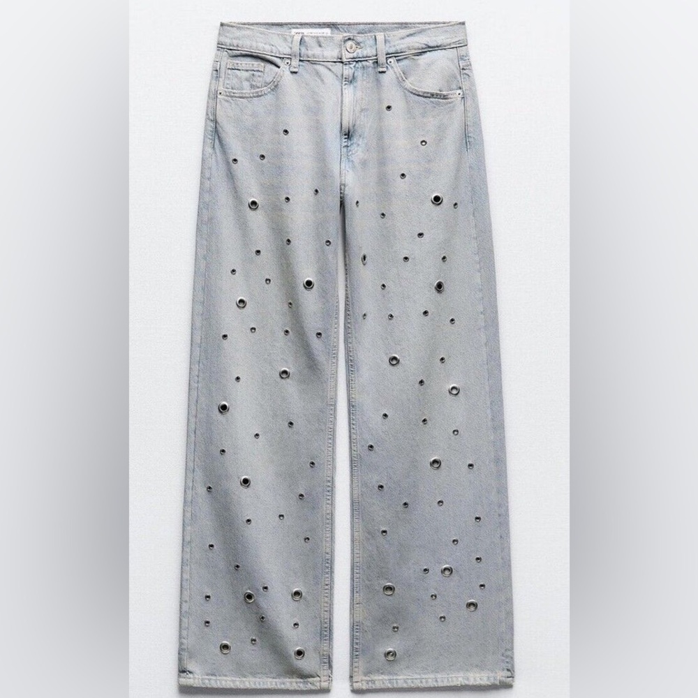 Stylish Light Blue Jeans with Eyelet Detailing